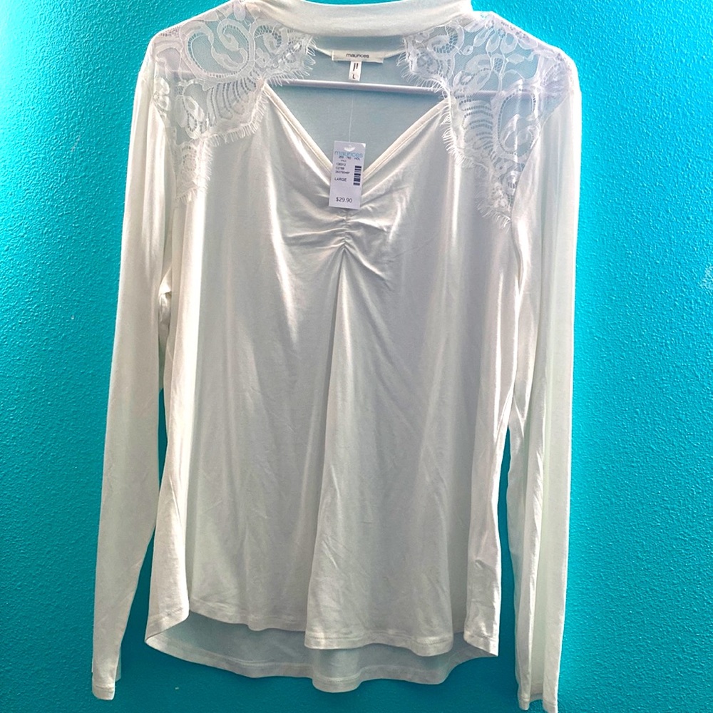 White long sleeve with lace around the collar